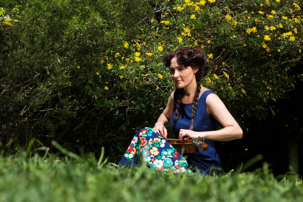 Ami Williamson Holding Dulcimer Grass